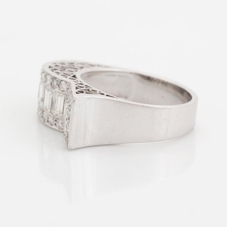 An 18K white gold ring set with baguette- and eight-cut diamonds.