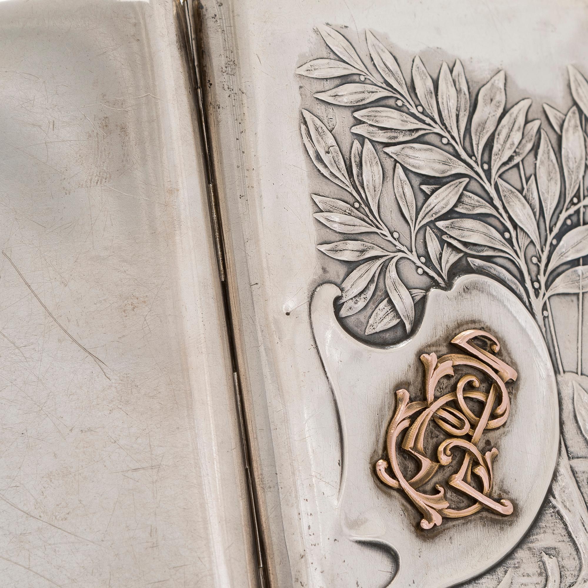 A silver cigarette case, Moscow, dated 1916.