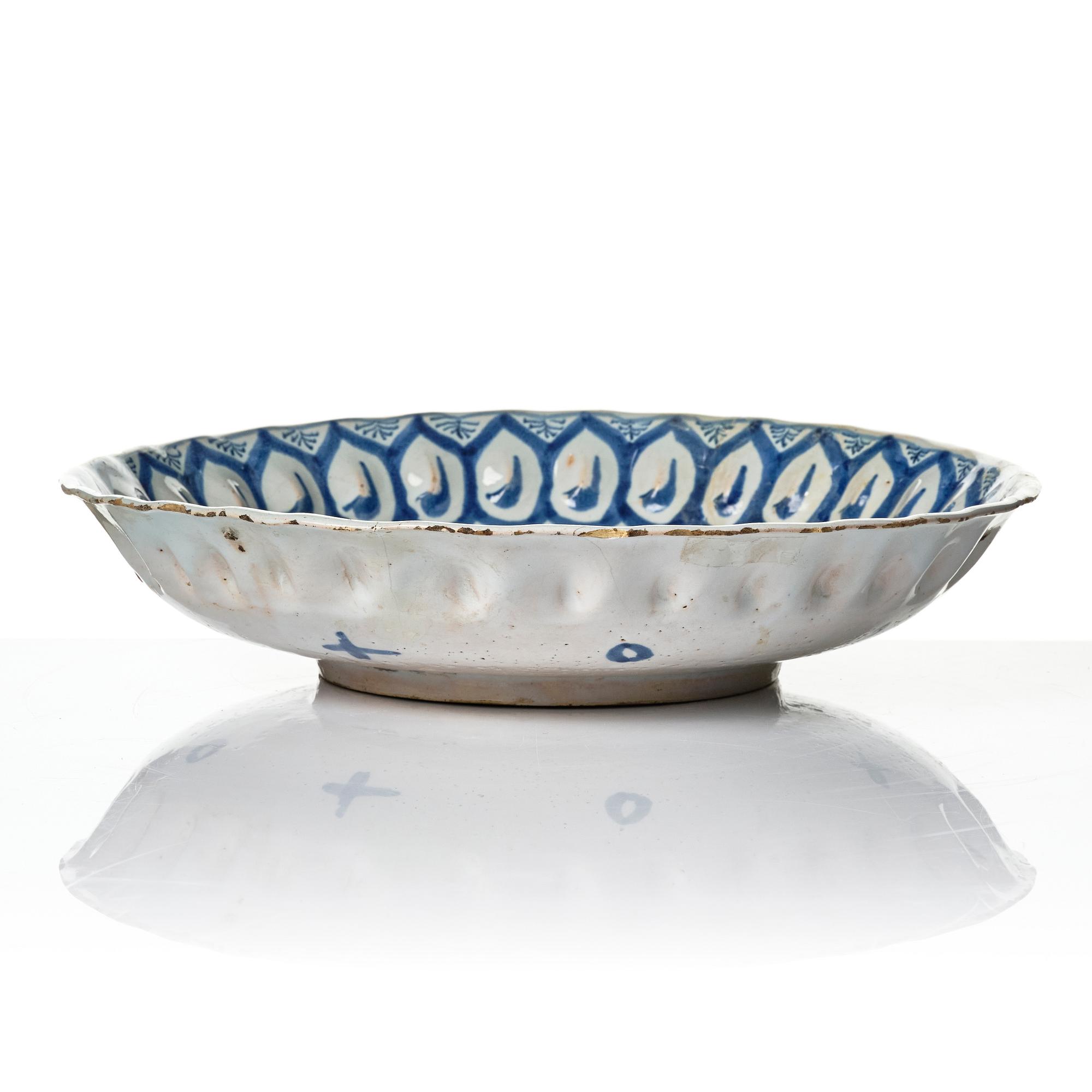 A group of three faience dishes, 18th century.