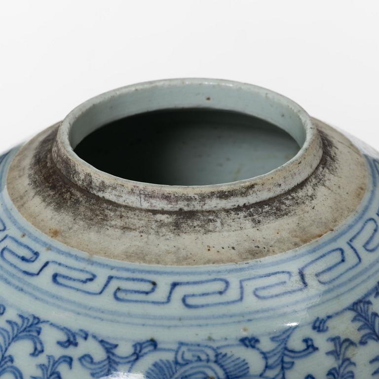 A pair of Chinese blue and white porcealin jars with wooden covers, Qing dynasty, 19th Century.