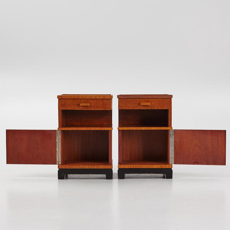 A pair of 1930's bedside tables.