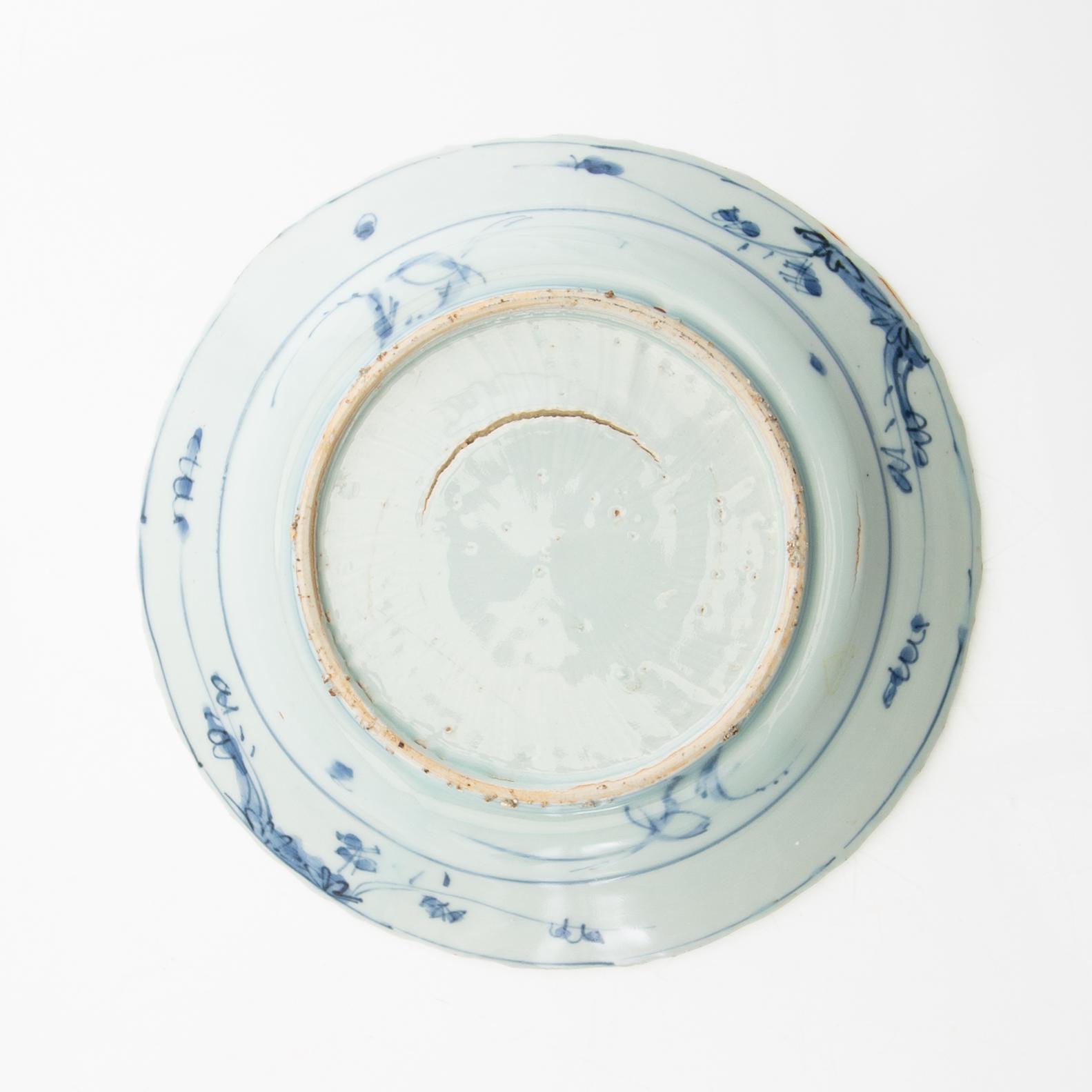 A blue and white dish and cup, Ming dynasty.