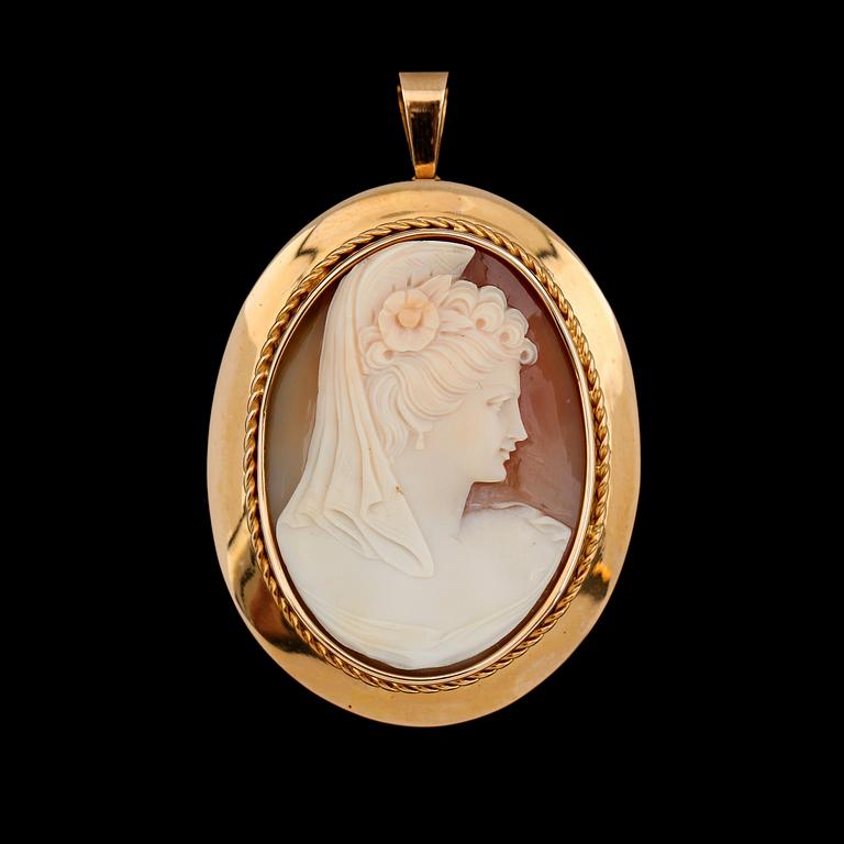 BROSCH/HÄNGE, 18K guld och snäckskalskamé, svenska stämplar, 1957.