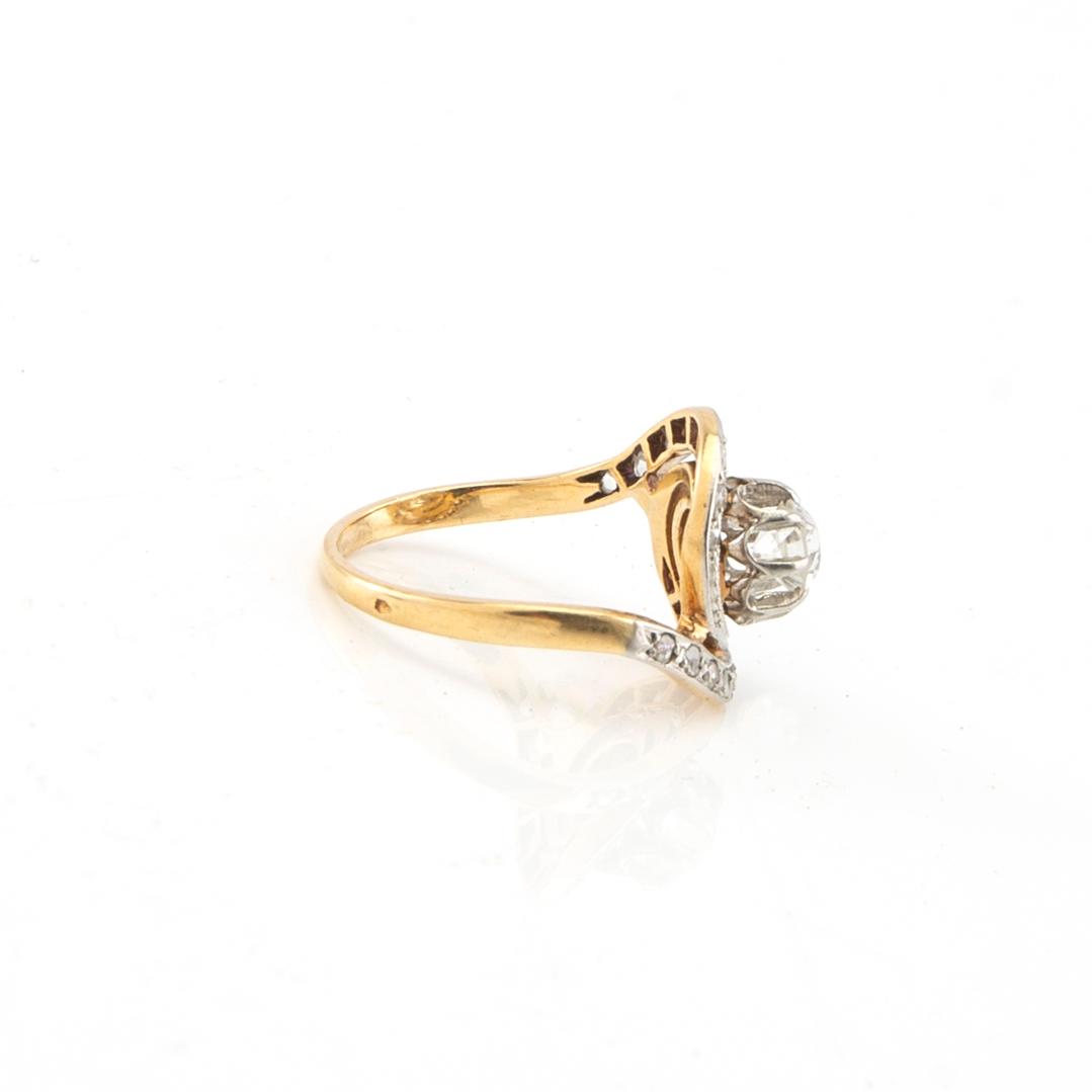 Ring in 18K gold with old-cut and rose-cut diamonds, France, first half of the 20th century.
