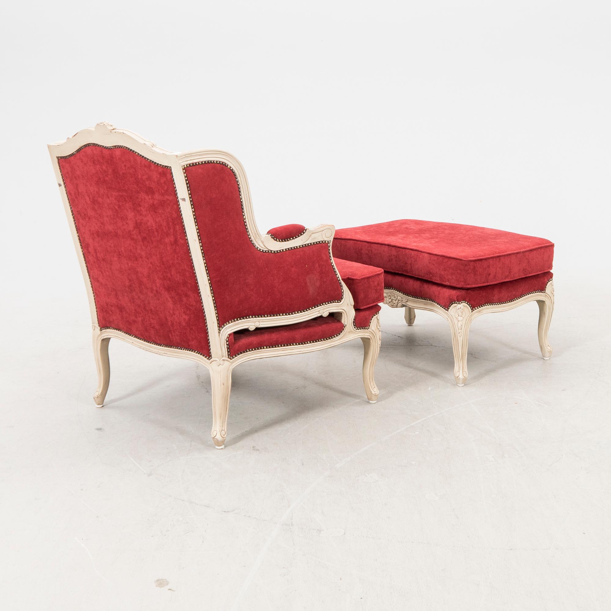 A Louis XV style armchair with stool second part of the 20th century.