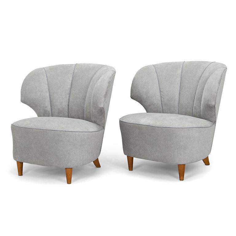A pair of mid 20th century armchairs.