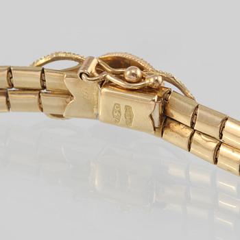 ARMBAND, 18K guld med cabochonslipad variscit, Arezzo, Italien. Vikt 15,7 gram.