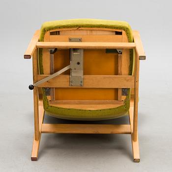 A 1960s 'Puck' armchair for Keravan Puusepäntehdas, Stockmann, Finland.