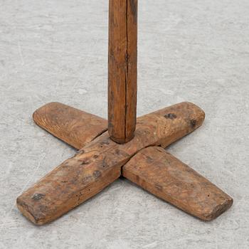 A floor candlestick, 19th Century.