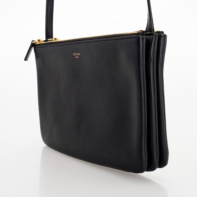 Céline, a black leather 'Trio Small' bag.
