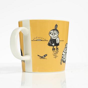 Muminmugg, "Mörk gul" med etikett, Arabia, Finland, 1991-99.
