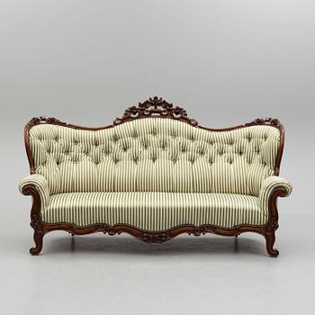 An end of the 19th century rococo style sofa.