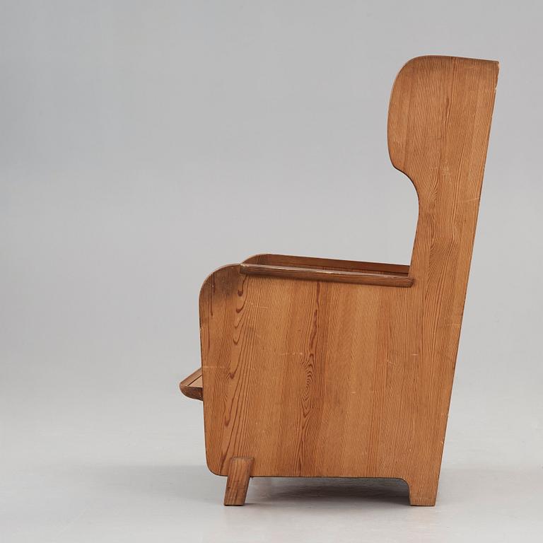 Axel Einar Hjorth, a stained pine 'Lovö' armchair, Nordiska Kompaniet, NK, Sweden 1930's.