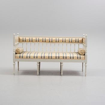 A GUSTAVIAN STYLE SETTEE, fist half of the 20th century.
