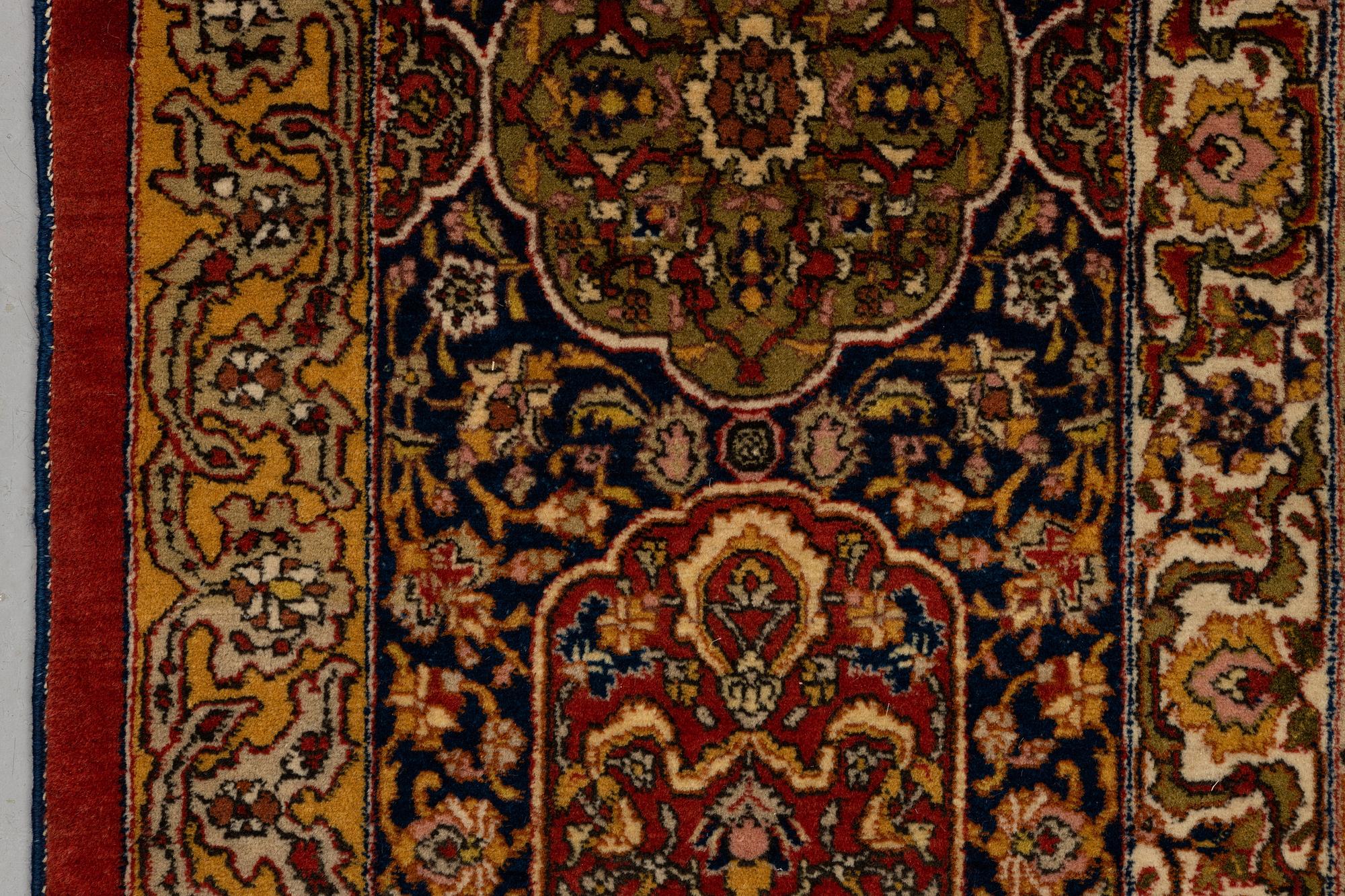 A carpet, semi-antique Tabriz, ca 398 x 290 cm.