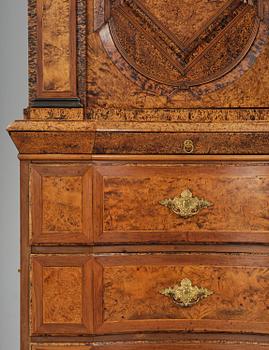 A Swedish late baroque burr-alder cabinet, first part 18th century.