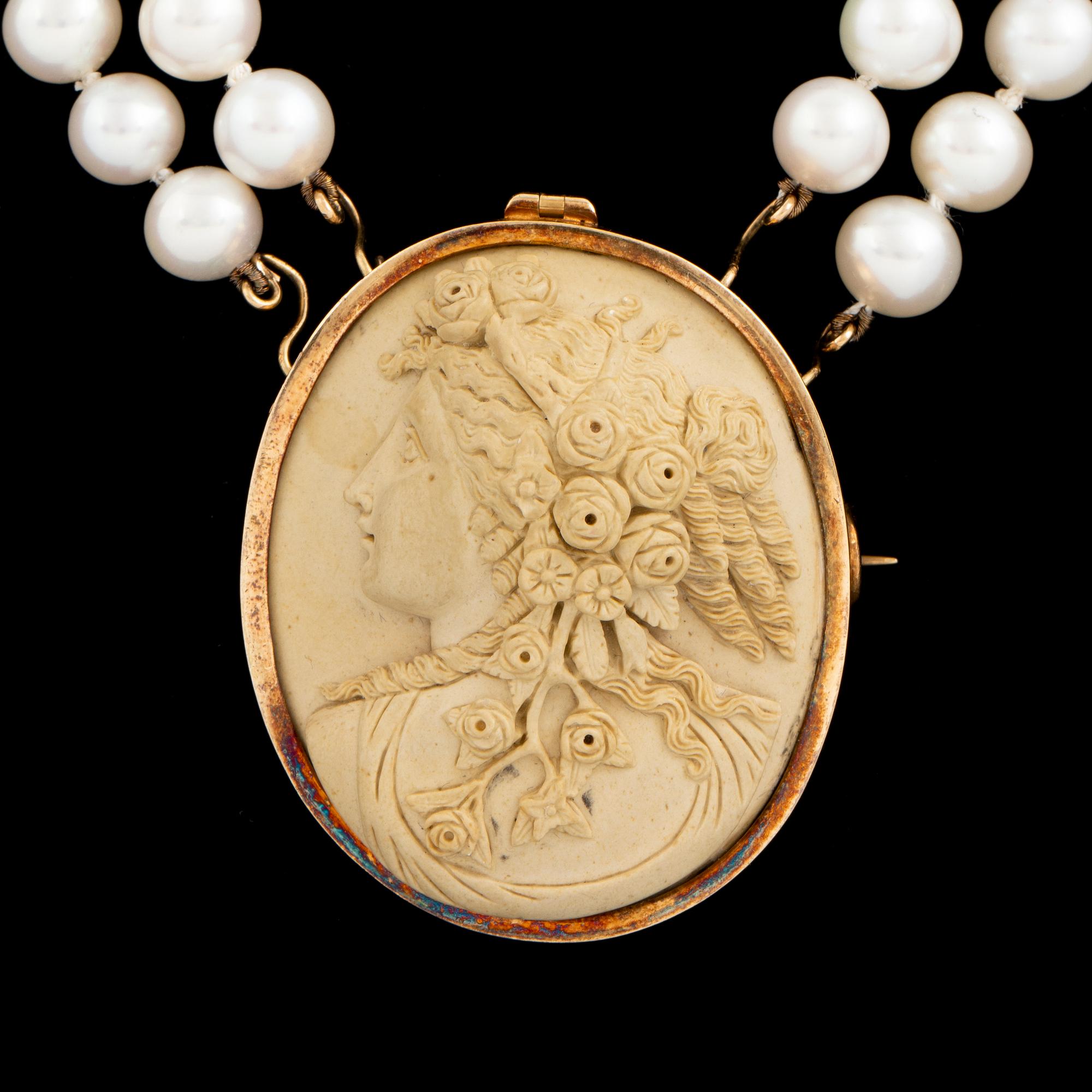 Lava cameo and cultured pearl necklace.