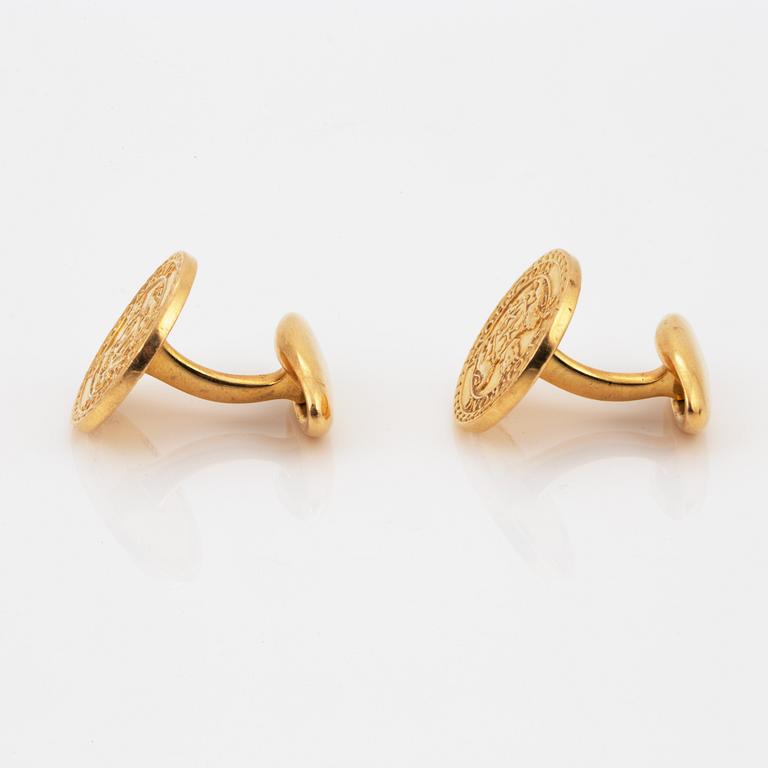 MANSCHETTKNAPPAR, Sporrong, 18K guld.