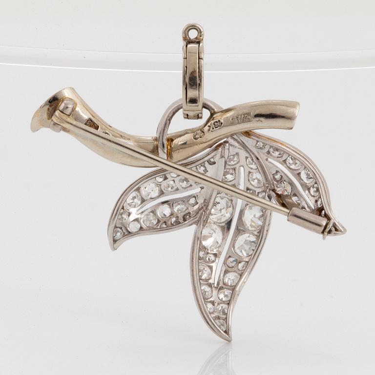 A brooch/pendant in 18K white gold set with old- and eight-cut diamonds.