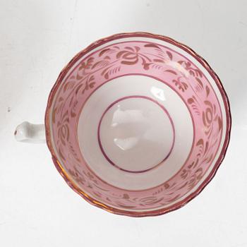 Twelve cups and saucers, England, 19th century.