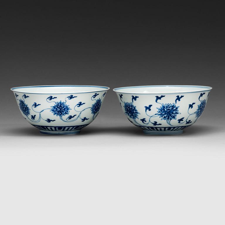 A pair of blue and white bowls, Qing dynasty, with Kangxis six character mark.