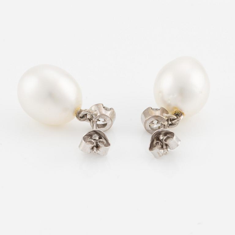 Earrings, a pair, with cultured pearls and brilliant-cut diamonds.