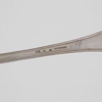 Two silver serving spoons, including Johan Petter Grönwall, Stockholm, 1827, and unidentified master, Stockholm, 1821.