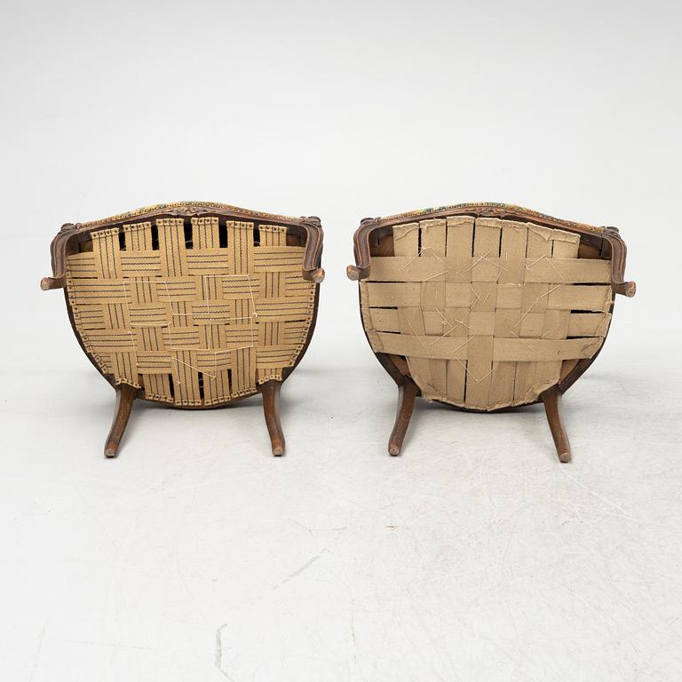 A pair of Rococo style armchairs, around 1900.