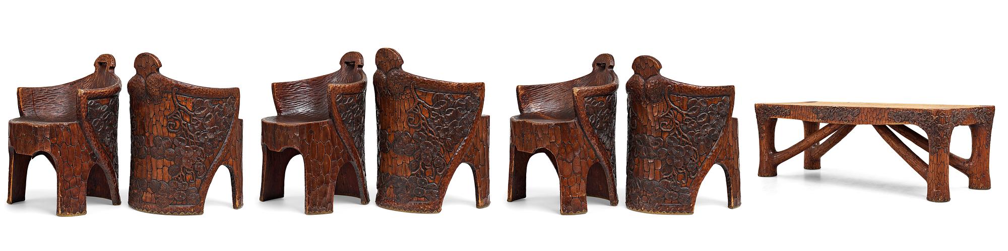Gustaf Fjaestad, an Art Nouveau carved pine table, Arvika Sweden 1914, a double to the table in the Thiel Collection,