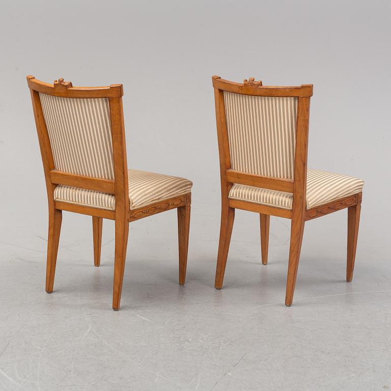 Six Louis XVI style oak chairs from around the year 1900.