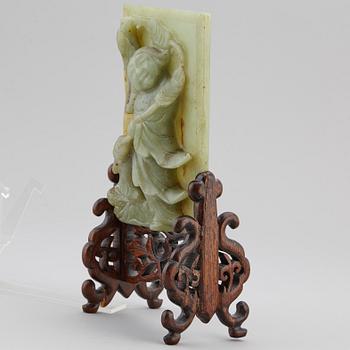 A Chinese green stone sculpture, 20th century.