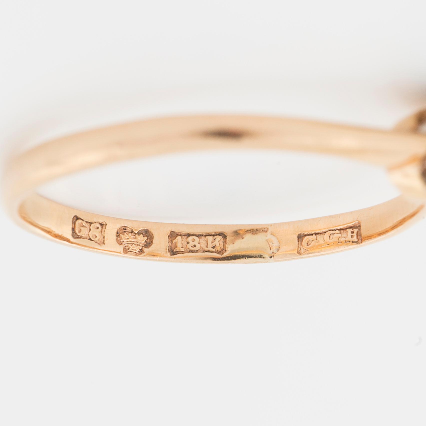 A old cut diamond ring by CG Hallberg, Stockholm, 1933.