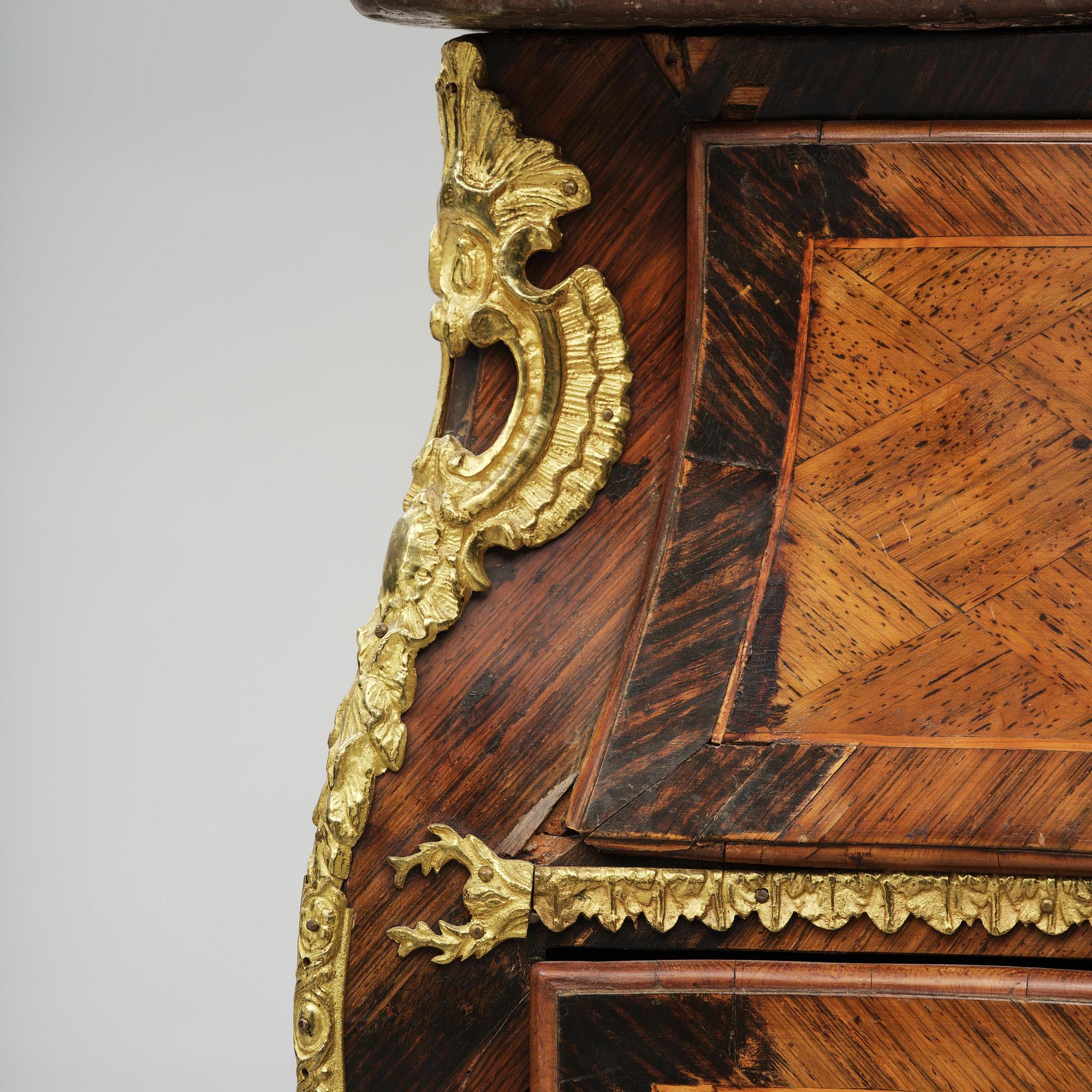 A parquetry and ormolu mounted rococo commode attributed to C. Tietze (master in Stockholm 1764.91).