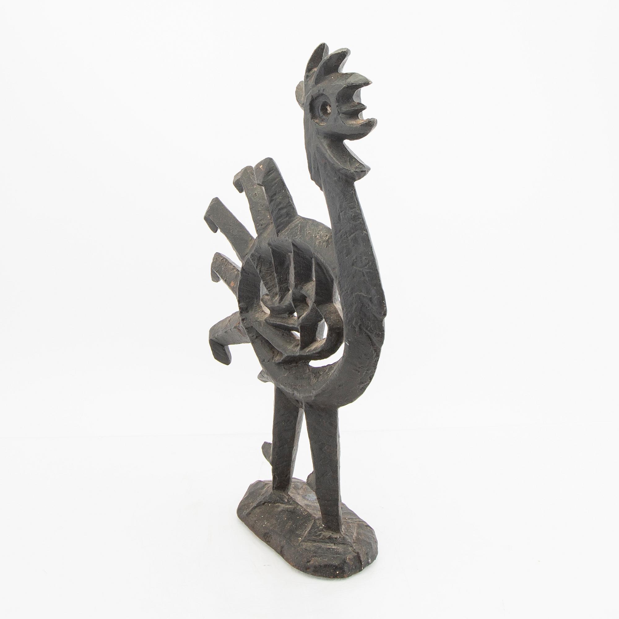 Olle Hermansson, skulptur signerad Husqvarna.