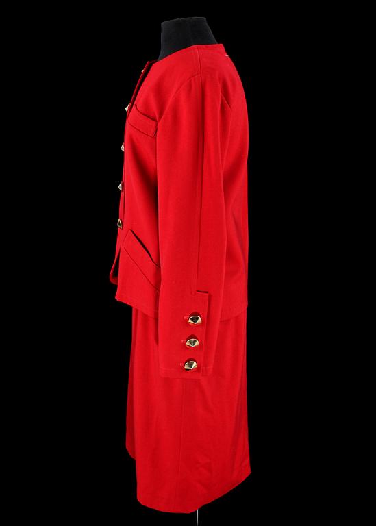 A 1991s red two-piece costume consisting of jacket and skirt  by Yves Saint Laurent.