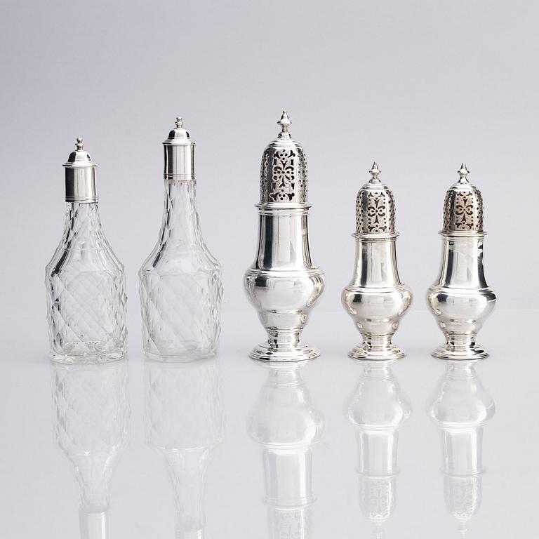 An English 18th century silver and glass cruet-set, mark of Jabez Daniel, London 1777 and possibly 1783.