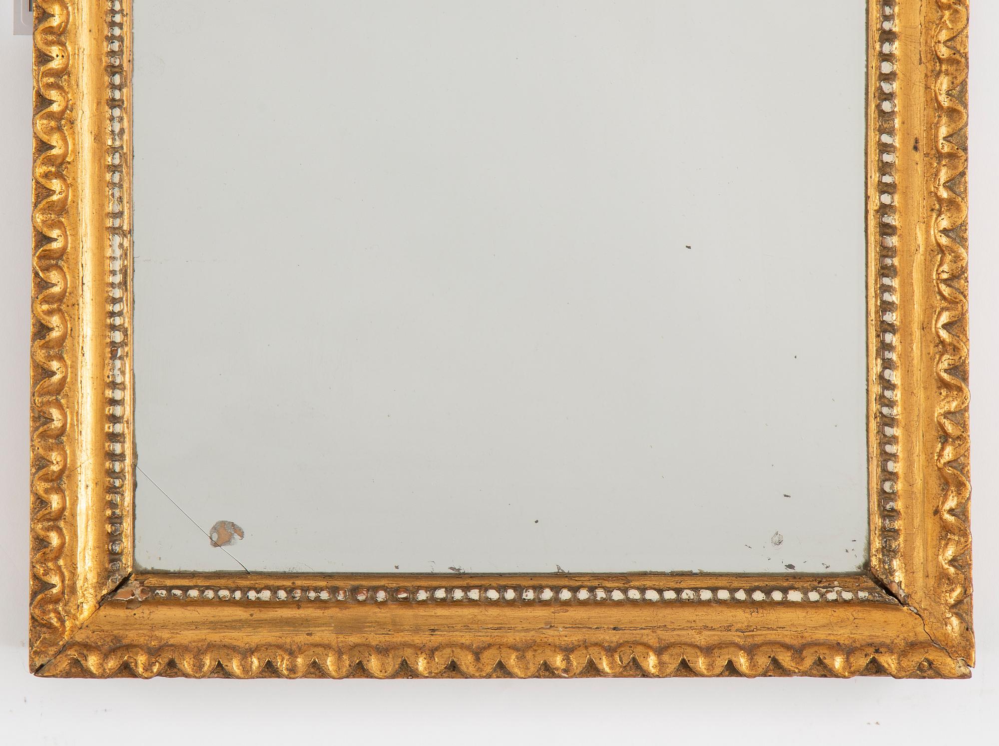 A northern european Louis XVI mirror, ca 1800.
