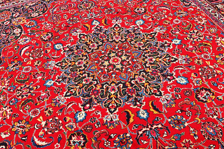 A Najafabad carpet, c. 351 X 305 cm.