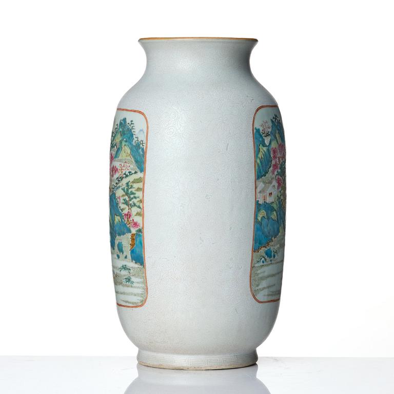 A large famille rose and scrafitto landscape vase, Qing dynasty, with Qianlong seal mark in red.