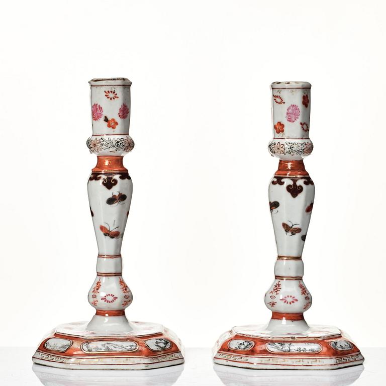 A pair of rouge de fer and grisaille export candle sticks, Qing dynasty, Qianlong (1736-95).