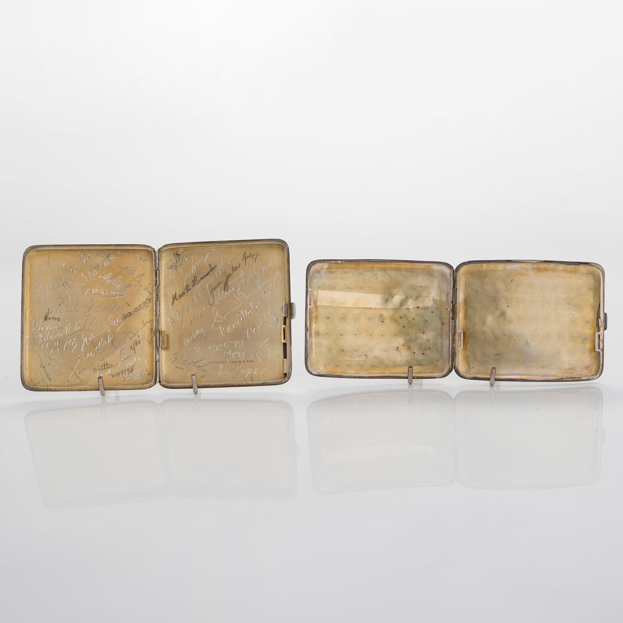 Two silver cigarette cases, J. H. Werner, Berlin, 1922, and Huguenin Frères, Switzerland before 1933.