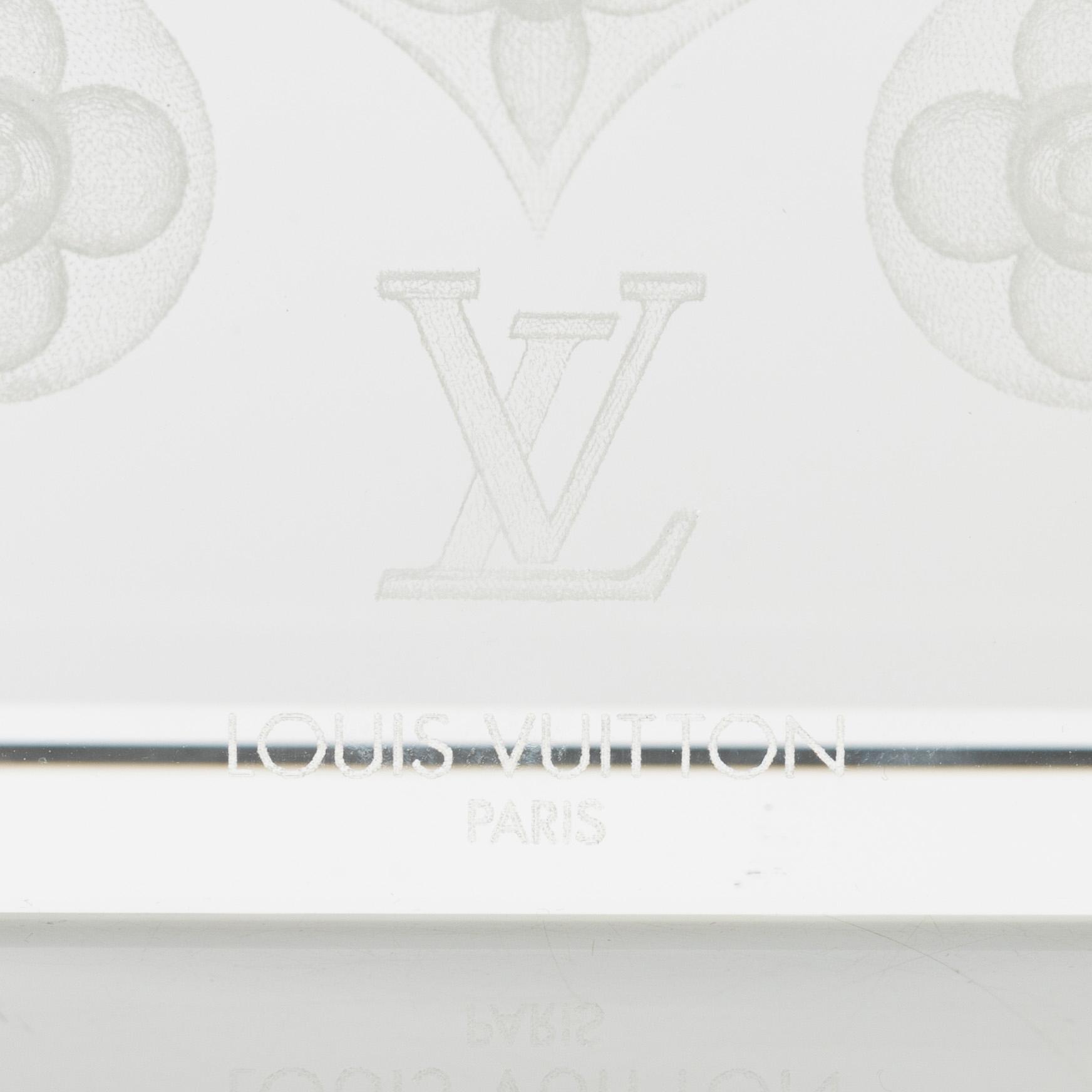 Louis Vuitton, a monogram crystal paper weight.
