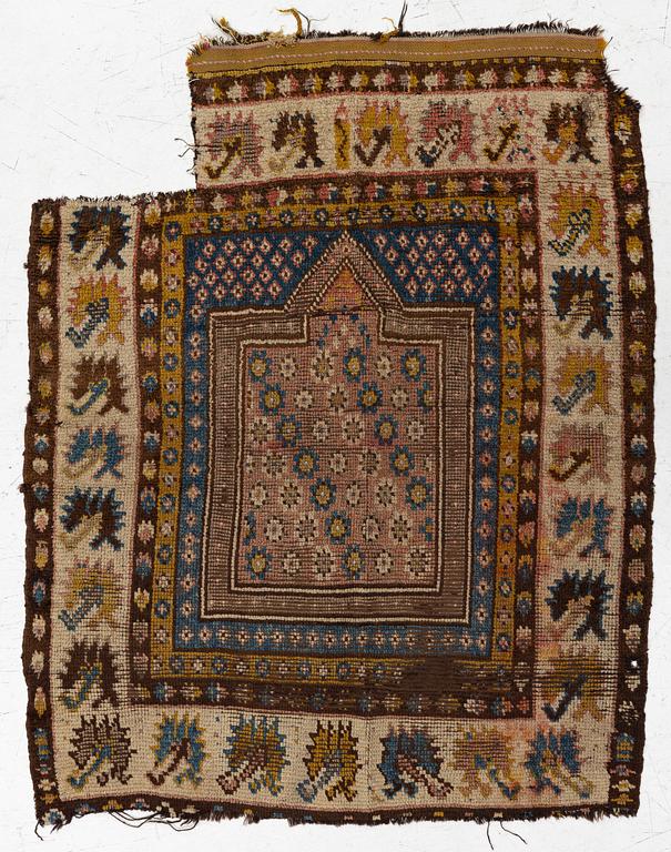 An antique Monastir prayer rug fragment , Ottoman Empire, c 133 x 106 cm.