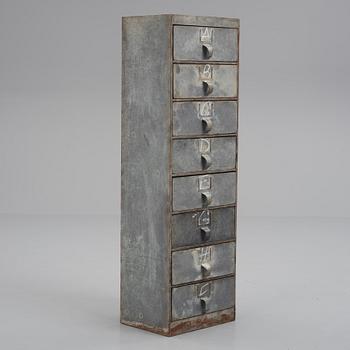 A contemporary metal chest of drawers.