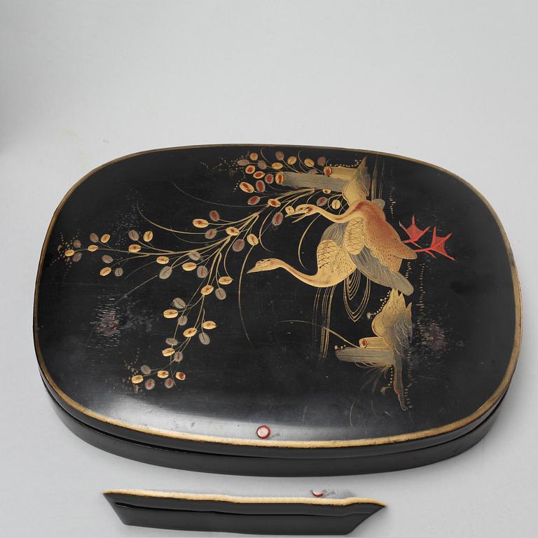 Two Japanese lacquered boxes with covers, circa 1900.