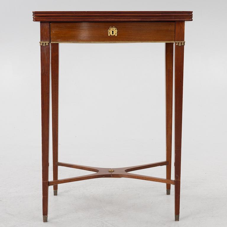 A late Gustavian style games table/sewing table, early 20th century.