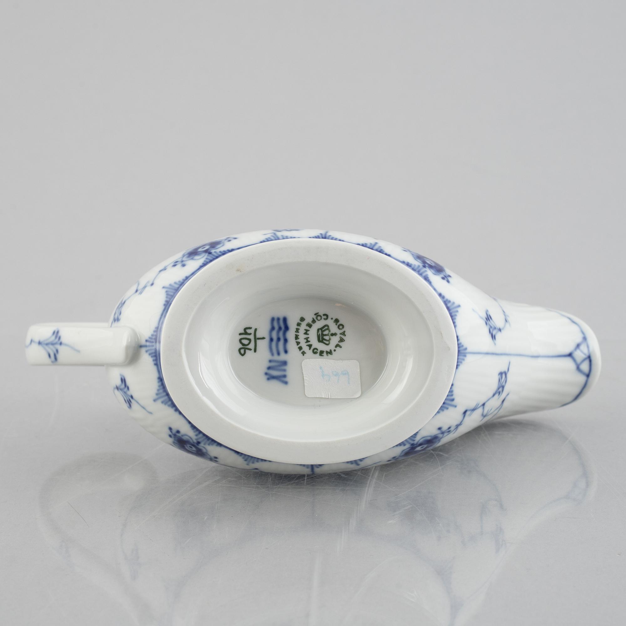 A 'Blue Fluted Plain' /'Musselmalet' sauce boat with stand, Royal Copenhagen, model 406 and 409, 1963 and 1893-1900.