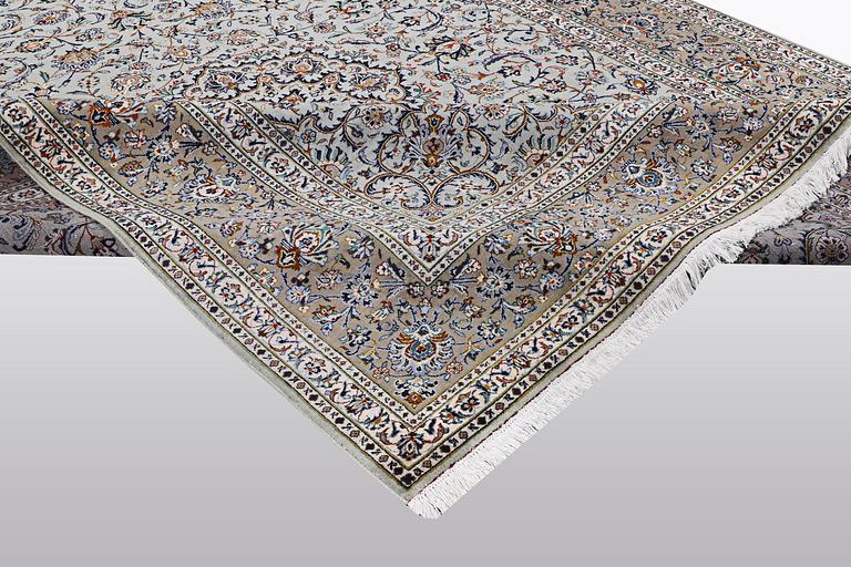 A carpet, Kashan, signed Fani, ca 420 x 300 cm.