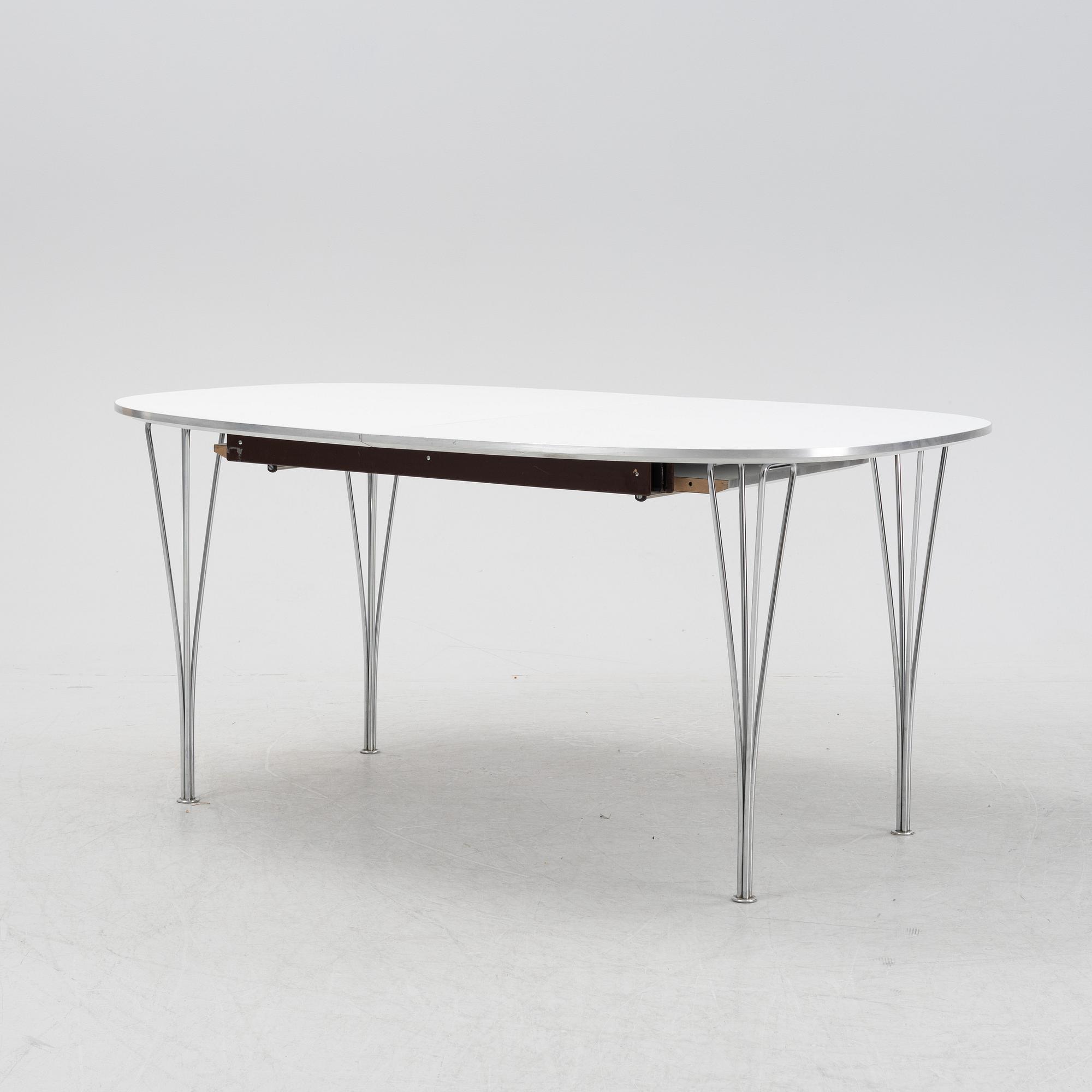 A 'Super elliptical' dining table by Bruno Mathsson & Piet Hein, from around the year 2000.