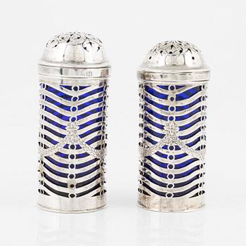 A pair of English salt and pepper shakers, silver and glass, London 1802-3, unidentified makers's mark.